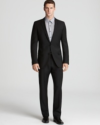 Look impeccable from head to toe in this striking suit from HUGO BOSS, crafted in seasonless wool for versatile year-round wear. Look impeccable from head to toe in this striking suit from HUGO BOSS, crafted in seasonless wool for versatile year-round wear.