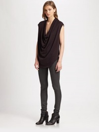 From the HELMUT capsule collection. Softly draped jersey with cap sleeves and a modern shirttail hem hitting below the hips. CowlneckCap sleevesShirttail hem hits below the hipsAbout 30 from shoulder to hem50% modal/50% pima cottonDry cleanImportedModel shown is 5'10 (177cm) wearing US size Small. From the HELMUT capsule collection. Softly draped jersey with cap sleeves and a modern shirttail hem hitting below the hips. CowlneckCap sleevesShirttail hem hits below the hipsAbout 30 from shoulder to hem50% modal/50% pima cottonDry cleanImportedModel shown is 5'10 (177cm) wearing US size Small.