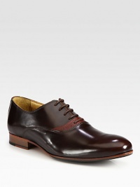 A perfect blend of shiny and pebbled leather makes an impressive statement of style.Leather upperLeather liningPadded insoleLeather soleImported A perfect blend of shiny and pebbled leather makes an impressive statement of style.Leather upperLeather liningPadded insoleLeather soleImported