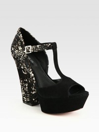 Held in place by an adjustable ankle strap, this suede t-strap design has exotic snakeskin trim and a chunky block heel. Snakeskin print heel, 4 (100mm)Suede platform, 1 (25mm)Compares to a 3 heel (75mm)Snakeskin print and suede upperLeather lining and solePadded insoleImported Held in place by an adjustable ankle strap, this suede t-strap design has exotic snakeskin trim and a chunky block heel. Snakeskin print heel, 4 (100mm)Suede platform, 1 (25mm)Compares to a 3 heel (75mm)Snakeskin print and suede upperLeather lining and solePadded insoleImported
