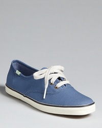 Classic Keds Champion sneakers fit with any casual wear; these come with two sets of laces to tie up your look.