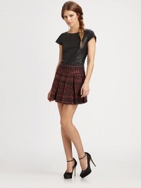 Classic tweed kicked up on a notch in a flirty box-pleat mini you can dress up or down.Wide waistbandFlared silhouetteCenter back zipperAbout 16 long27% viscose/23% polyester/18% polyacrylic/14% virgin wool/8% wool/7% nylon/3% acetateDry cleanImportedModel shown is 5'8½ (174cm) wearing US size 4. Classic tweed kicked up on a notch in a flirty box-pleat mini you can dress up or down.Wide waistbandFlared silhouetteCenter back zipperAbout 16 long27% viscose/23% polyester/18% polyacrylic/14% virgin wool/8% wool/7% nylon/3% acetateDry cleanImportedModel shown is 5'8½ (174cm) wearing US size 4.