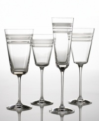 The Library Stripe wine glass is a perfect example of what kate spade does best: Mixing classical design with modern touches. Alternating deep cut bands of frosted and clear crystal combine for a chic sensibility. Wine glass back left.