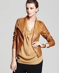Every fashion maven's must-have is a luxe leather jacket--fill the void with this Vince Scuba version in ultra-soft leather, featuring a modern, oversize collar and rib knit accents. Every fashion maven's must-have is a luxe leather jacket--fill the void with this Vince Scuba version in ultra-soft leather, featuring a modern, oversize collar and rib knit accents.
