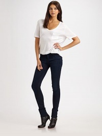 Chic dark-rinse denim, crafted in an ultra-skinny silhouette.THE FITFitted through hips and thighsRise, about 8Inseam, about 32THE DETAILSZip flyFive-pocket style52% tencel/46% cotton/2% spandexMachine washMade in USA of imported fabricModel shown is 5'9 (175cm) wearing US size 4. Chic dark-rinse denim, crafted in an ultra-skinny silhouette.THE FITFitted through hips and thighsRise, about 8Inseam, about 32THE DETAILSZip flyFive-pocket style52% tencel/46% cotton/2% spandexMachine washMade in USA of imported fabricModel shown is 5'9 (175cm) wearing US size 4.
