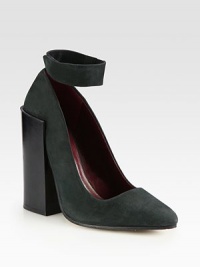 Suede pump lifted by a killer wooden heel and topped off with a trend-worthy ankle strap. Wooden heel, 5 (125mm)Suede upperAnkle strap with snap closureLeather lining and solePadded insoleMade in Italy Suede pump lifted by a killer wooden heel and topped off with a trend-worthy ankle strap. Wooden heel, 5 (125mm)Suede upperAnkle strap with snap closureLeather lining and solePadded insoleMade in Italy