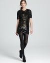 R.S.V.P. to the party with sparkle and shine in this dazzling Dolce Vita dress--festooned with gleaming sequins, this uber-chic mini struts fearlessly into fall, determined to wow.