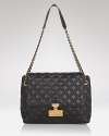 Classic and crave-inducing, Marc Jacob's quilted satchel is a luxe essential for style-setters of any generation.