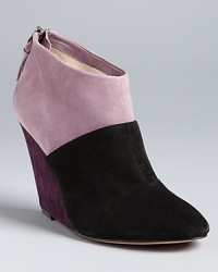 Jean-Michel Cazabat brings on-point colorblocking into these must-acquire wedge booties. Jean-Michel Cazabat brings on-point colorblocking into these must-acquire wedge booties.