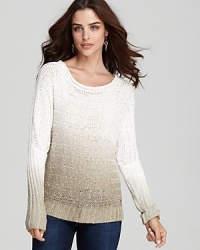 This lightweight sweater from GUESS flaunts a painterly dip-dye effect for new-season style. This lightweight sweater from GUESS flaunts a painterly dip-dye effect for new-season style.
