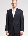 EXCLUSIVELY OURS. An essential look that travels as well as it wears, tailored in sophisticated wool super 120s that never goes out of style. Two-button closure Chest welt, waist flap pockets About 30¼ from shoulder to hem Loro Piana serge wool; dry clean Imported Additional Information Men's Suits Size Guide 