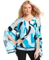 Give your look the graphic treatment with this diaphanous top from MICHAEL Michael Kors, the perfect pick for day or night with its exquisite draping and cutout details. Give your look the graphic treatment with this diaphanous top from MICHAEL Michael Kors, the perfect pick for day or night with its exquisite draping and cutout details.