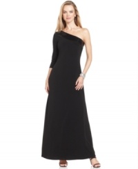 Glamour is effortless in this one-shoulder Calvin Klein gown, crowned with a band of sequins at the neckline. Glamour is effortless in this one-shoulder Calvin Klein gown, crowned with a band of sequins at the neckline.