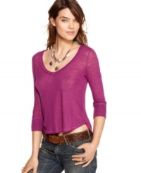 An asymmetrical hi-lo hem adds edge to this Free People tee -- perfect for a casual yet cool look! An asymmetrical hi-lo hem adds edge to this Free People tee -- perfect for a casual yet cool look!