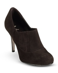 Simply chic, Cole Haan's suede heels pare essential bootie elements down to one sleek style. Simply chic, Cole Haan's suede heels pare essential bootie elements down to one sleek style.