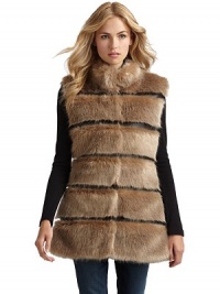 THE LOOKFaux fur designFaux leather panels Concealed front snap closureFront seam pockets THE FITAbout 29 from shoulder to hemTHE MATERIALModacrylic/polyesterFully linedCARE & ORIGINMachine washImportedModel shown is 5'11 (180cm) wearing US size Small. THE LOOKFaux fur designFaux leather panels Concealed front snap closureFront seam pockets THE FITAbout 29 from shoulder to hemTHE MATERIALModacrylic/polyesterFully linedCARE & ORIGINMachine washImportedModel shown is 5'11 (180cm) wearing US size Small.