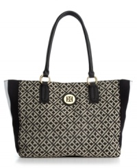 The quintessential signature jacquard logo tote by Tommy Hilfiger is elegantly versatile for carrying all your essentials. This polished piece features pretty goldtone hardware details for a touch of class. The quintessential signature jacquard logo tote by Tommy Hilfiger is elegantly versatile for carrying all your essentials. This polished piece features pretty goldtone hardware details for a touch of class.