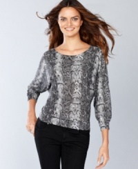 A hot snakeskin print and subtle metallic accents make this petite INC sweater a knockout piece! A hot snakeskin print and subtle metallic accents make this petite INC sweater a knockout piece!