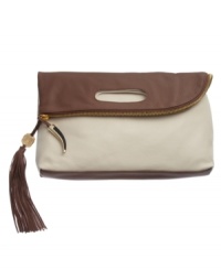 Incredibly supple leather lends a slouchy feel to the oversize Juliann Clutch from Vince Camuto. This reversible, foldover clutch has contrasting colors on both sides that can be flipped to highlight either tone, a zipper closure and luxe horn and tassel detailing at the closure.