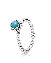 This birthstone ring features a beaded silver band with a polished turquoise solitaire. Perfect worn on its own or stacked with other PANDORA pieces. This birthstone ring features a beaded silver band with a polished turquoise solitaire. Perfect worn on its own or stacked with other PANDORA pieces.