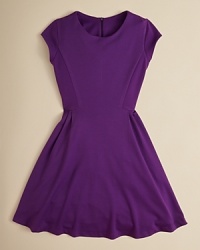 A classic fitted dress with a fun, flared skirt. A classic fitted dress with a fun, flared skirt.