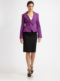 An impeccably tailored double-breasted blazer, cropped and nipped at the waist for a feminine fit.Notch collarDouble-breasted button frontWide waistbandPrincess seamsInverted pleats at hipsTie-back beltBack inverted pleatsAbout 21 from shoulder to hem75% cotton/23% viscose/2% elastaneDry cleanMade in USA of Italian fabricModel shown is 5'10 (177cm) wearing US size 4. An impeccably tailored double-breasted blazer, cropped and nipped at the waist for a feminine fit.Notch collarDouble-breasted button frontWide waistbandPrincess seamsInverted pleats at hipsTie-back beltBack inverted pleatsAbout 21 from shoulder to hem75% cotton/23% viscose/2% elastaneDry cleanMade in USA of Italian fabricModel shown is 5'10 (177cm) wearing US size 4.
