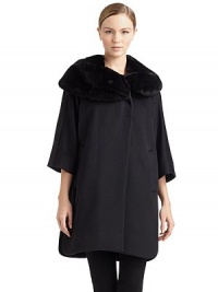 THE LOOKSilky smooth rabbit fur shawl collarTailored from fine wool/angoraConcealed front buttonsThree-quarter length cape sleevesDual front welt pocketsSide slitsTHE FITAbout 36 from shoulder to hemTHE MATERIALWool/angoraTrim: dyed rabbit furFully linedCARE & ORIGINDry clean by fur specialistMade in ItalyFur origin: ChinaModel shown is 5'9 (175cm) wearing US size 4. THE LOOKSilky smooth rabbit fur shawl collarTailored from fine wool/angoraConcealed front buttonsThree-quarter length cape sleevesDual front welt pocketsSide slitsTHE FITAbout 36 from shoulder to hemTHE MATERIALWool/angoraTrim: dyed rabbit furFully linedCARE & ORIGINDry clean by fur specialistMade in ItalyFur origin: ChinaModel shown is 5'9 (175cm) wearing US size 4.
