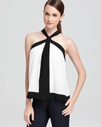 Evoke Grecian-goddess in a softly draped BCBGMAXAZRIA top--complete with modern color blocking and cool back cutouts. Evoke Grecian-goddess in a softly draped BCBGMAXAZRIA top--complete with modern color blocking and cool back cutouts.