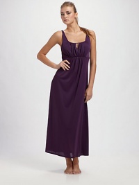 Flattering and skin-caressing soft, this floor-length design has an Empire waist and front keyhole for added appeal.Softly shirred bodice About 52 from shoulder to hem Polyester; machine wash Imported Flattering and skin-caressing soft, this floor-length design has an Empire waist and front keyhole for added appeal.Softly shirred bodice About 52 from shoulder to hem Polyester; machine wash Imported