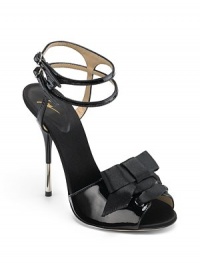 THE LOOKLace-up satin bow detailDouble ankle straps with buckle closuresMetal-tipped heelTHE FITHeel 4½ (115mm)THE MATERIALPatent leather & satin upperMetal heelLeather lining and soleORIGINMade in Italy THE LOOKLace-up satin bow detailDouble ankle straps with buckle closuresMetal-tipped heelTHE FITHeel 4½ (115mm)THE MATERIALPatent leather & satin upperMetal heelLeather lining and soleORIGINMade in Italy