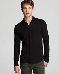 Give your shirt wardrobe a taste of nightlife with this downtown-inspired black button-down from John Varvatos USA LUXE. Give your shirt wardrobe a taste of nightlife with this downtown-inspired black button-down from John Varvatos USA LUXE.