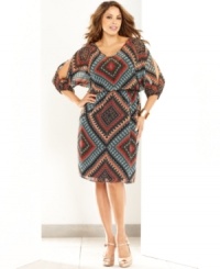 Snag a stylish office look with INC's split-sleeve plus size dress, defined by a blouson silhouette. (Clearance) Snag a stylish office look with INC's split-sleeve plus size dress, defined by a blouson silhouette. (Clearance)