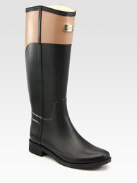 Waterproof classic in an equestrian-inspired, two-tone design. Rubber heel, 1 (25mm)Shaft, 15Leg circumference, 14Rubber upperPull-on styleJersey liningRubber solePadded insoleImported Waterproof classic in an equestrian-inspired, two-tone design. Rubber heel, 1 (25mm)Shaft, 15Leg circumference, 14Rubber upperPull-on styleJersey liningRubber solePadded insoleImported