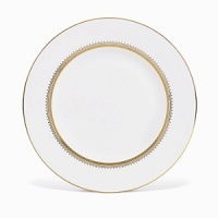 Rings of gold adorn fine white bone china with the lustrous shine of a wedding band. White bone china features two different border trims of gold, a wide corded border of textured grosgrain ribbon on some pieces, a narrow edge on others. Rings of gold adorn fine white bone china with the lustrous shine of a wedding band. White bone china features two different border trims of gold, a wide corded border of textured grosgrain ribbon on some pieces, a narrow edge on others.