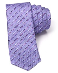 Indulge in the exceptionally soft, textured silk of this fine tie from HUGO, featuring a skinny silhouette for modern appeal and an alluring stripe pattern. Indulge in the exceptionally soft, textured silk of this fine tie from HUGO, featuring a skinny silhouette for modern appeal and an alluring stripe pattern.