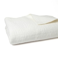 Cozy and luxurious, this Donna Karan quilt boasts an irregular stitch pattern for that heirloom, handcrafted look. Cozy and luxurious, this Donna Karan quilt boasts an irregular stitch pattern for that heirloom, handcrafted look.