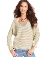 In a stylishly slouchy shape, this Free People striped sweater is a perfect fall layering piece!