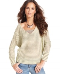 In a stylishly slouchy shape, this Free People striped sweater is a perfect fall layering piece! In a stylishly slouchy shape, this Free People striped sweater is a perfect fall layering piece!