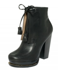Tie these on for size. The Kora high heel booties from the DKNY Collection are crafted from leather and feature a tie with tassel embellishments for added appeal. Tie these on for size. The Kora high heel booties from the DKNY Collection are crafted from leather and feature a tie with tassel embellishments for added appeal.