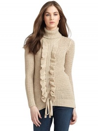 THE LOOKTurtleneckDouble ruffles down the centerLong sleeves with ribbed cuffsDrawstring tie at ribbed hemTHE FITAbout 28 from shoulder to hemTHE MATERIAL78% virgin wool/20% nylon/2% other fibersSecond fabric:: silkCARE & ORIGINHand wash or dry cleanMade in ItalyModel shown is 5'9 (175cm) wearing US size 4. THE LOOKTurtleneckDouble ruffles down the centerLong sleeves with ribbed cuffsDrawstring tie at ribbed hemTHE FITAbout 28 from shoulder to hemTHE MATERIAL78% virgin wool/20% nylon/2% other fibersSecond fabric:: silkCARE & ORIGINHand wash or dry cleanMade in ItalyModel shown is 5'9 (175cm) wearing US size 4.