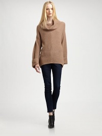 Touches of wool, angora and cashmere add a plush finish to this slouchy-cool cowlneck. CowlneckDropped shouldersLong, oversized sleeves with rolled cuffsLonger length hits below the hips45% nylon/40% viscose/5% angora/5% cashmere/5% woolHand washImportedModel shown is 5'9½ (176cm) wearing US size Small.OUR FIT MODEL RECOMMENDS ordering one size down as this style runs large. Touches of wool, angora and cashmere add a plush finish to this slouchy-cool cowlneck. CowlneckDropped shouldersLong, oversized sleeves with rolled cuffsLonger length hits below the hips45% nylon/40% viscose/5% angora/5% cashmere/5% woolHand washImportedModel shown is 5'9½ (176cm) wearing US size Small.OUR FIT MODEL RECOMMENDS ordering one size down as this style runs large.