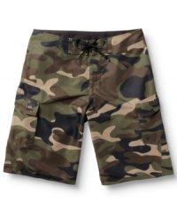 Hide in plain sight. These camo board shorts from Quiksilver give your beach look a jungle twist. Hide in plain sight. These camo board shorts from Quiksilver give your beach look a jungle twist.