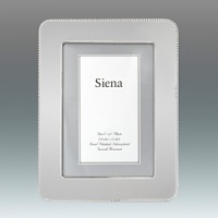 These distinctive and elegant silver-plated frames offer a beautiful way to showcase your pictures. Available in three sizes. These distinctive and elegant silver-plated frames offer a beautiful way to showcase your pictures. Available in three sizes.