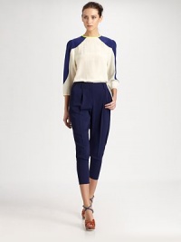 A refined, elegant take on the harem silhouette, tailored with crisp pleats and narrow zipper cuffs.Belt loopsFront pleatsSide slash pocketsNarrow zipper cuffsBack welt pocketsInseam, about 2697% viscose/3% spandexDry cleanMade in ItalyModel shown is 5'11 (180cm) wearing US size 4. A refined, elegant take on the harem silhouette, tailored with crisp pleats and narrow zipper cuffs.Belt loopsFront pleatsSide slash pocketsNarrow zipper cuffsBack welt pocketsInseam, about 2697% viscose/3% spandexDry cleanMade in ItalyModel shown is 5'11 (180cm) wearing US size 4.