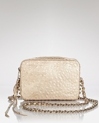 A leather Rebecca Minkoff crossbody bag flirts with the cutting edge, destined to turn-heads after-dark with distressed denim and a downtown attitude. A leather Rebecca Minkoff crossbody bag flirts with the cutting edge, destined to turn-heads after-dark with distressed denim and a downtown attitude.
