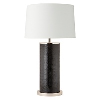 At home or in the office, this embossed leather lamp with polished silver exudes a refined quality. At home or in the office, this embossed leather lamp with polished silver exudes a refined quality.