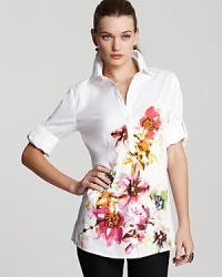 Bright florals bloom against a pure white backdrop for a feminine take on the classic BASLER button-up. Pair with sleek trousers and spring from work to play. Bright florals bloom against a pure white backdrop for a feminine take on the classic BASLER button-up. Pair with sleek trousers and spring from work to play.