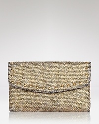 Elements of shimmer give this tweed Cornelia Guest clutch a touch of glitz that shines on when the ordinary evening bag just won't do.