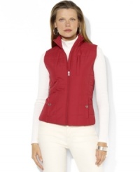 Lauren Ralph Lauren's lightweight vest in quilted microfiber is an essential layering piece, finished with L-RL-engraved metal snaps at the pockets for sporty appeal. Lauren Ralph Lauren's lightweight vest in quilted microfiber is an essential layering piece, finished with L-RL-engraved metal snaps at the pockets for sporty appeal.