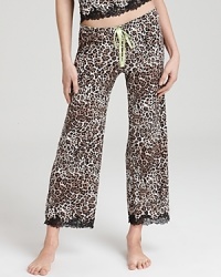 Be a stylish vixen in the bedroom with these leopard print, lace-trimmed pants. Be a stylish vixen in the bedroom with these leopard print, lace-trimmed pants.